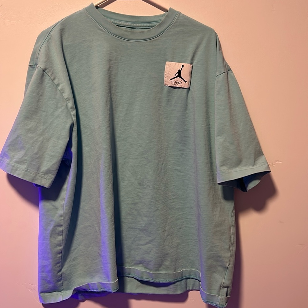 Men’s size large Jordan, white baby blue T-shirt